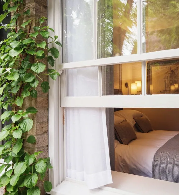 0025 – 2014 – Old Parsonage Hotel – Oxford – Low Res – Bedroom Window Greenery – Web Feature